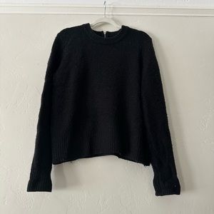 Cozy black sweater with zipper detail